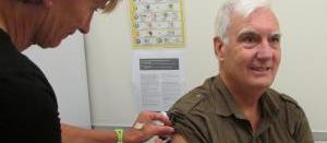 0416 Kevin Saunders gets his annual influenza immunisation from nurse Kristine Reid