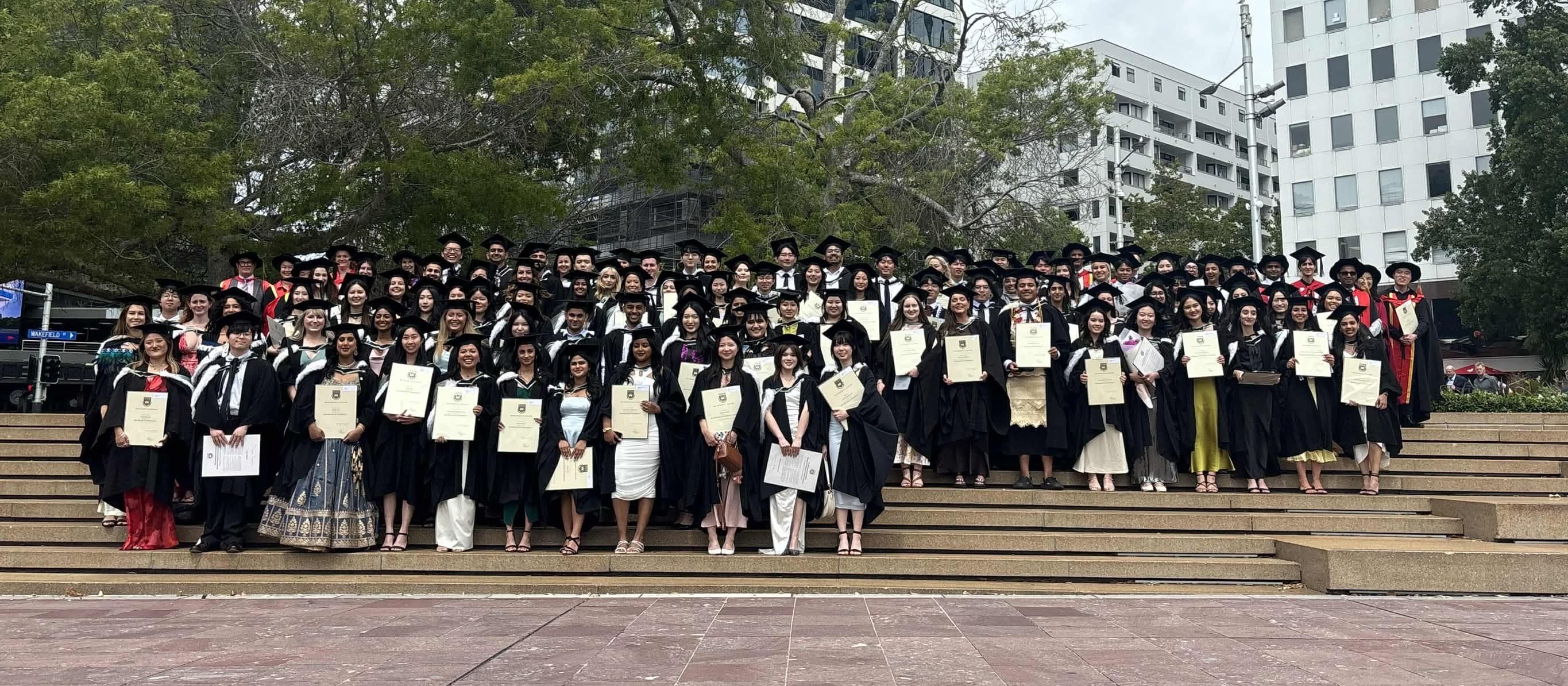 University of Auckland Bachelor of Pharmacy class of 2024 on the steps of Aotea Square, Auckland (CR supplied: Zhishu Lu)