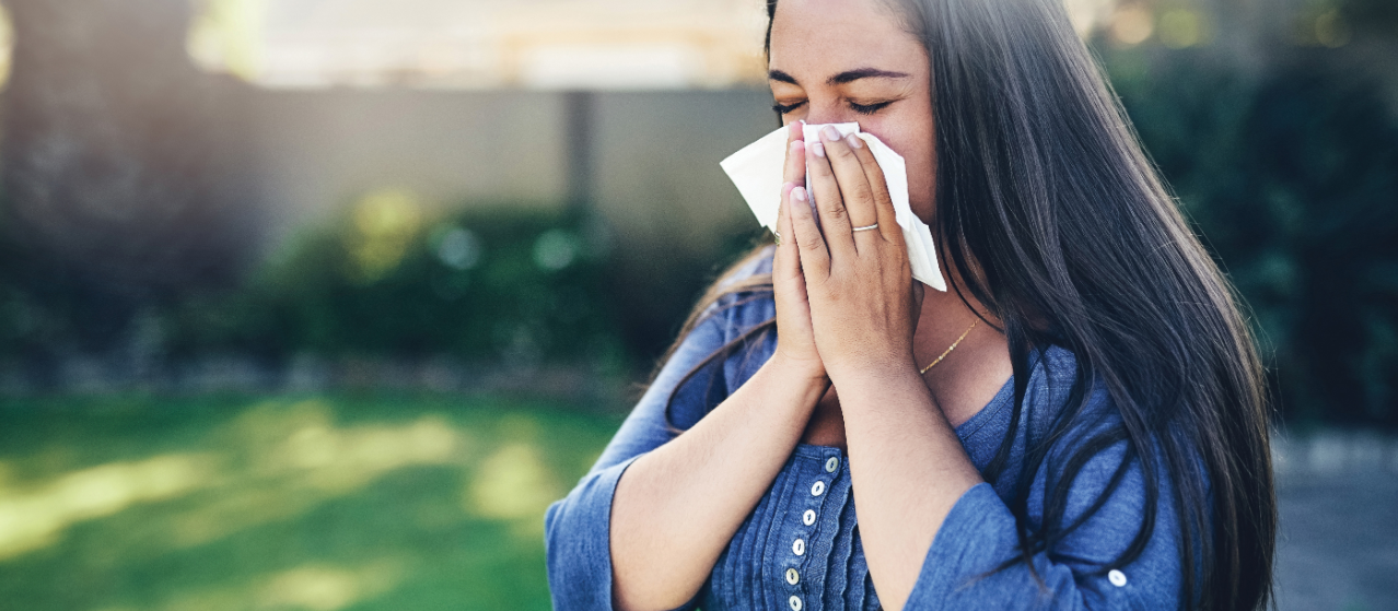 Sick sneeze cold flu woman CR istock