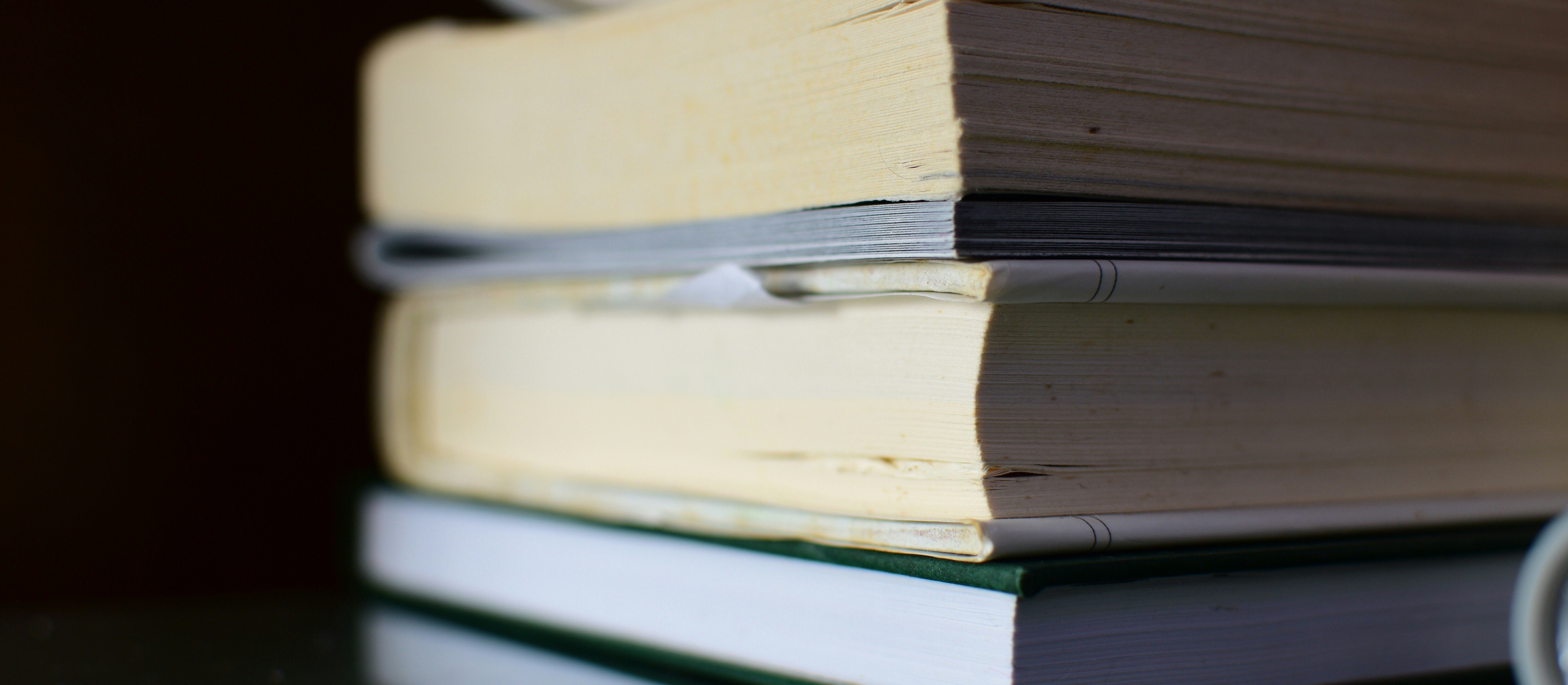 Stack of books, black background