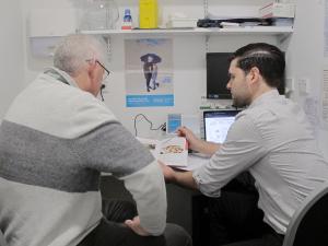 Dave Alsford with patient 