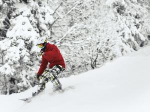 Snowboarding down a slop