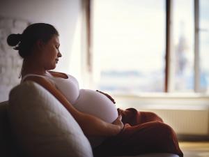 Pregnant woman on couch