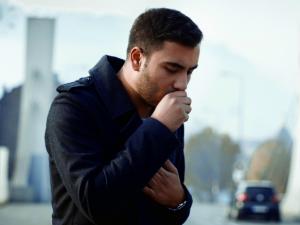 Man coughing