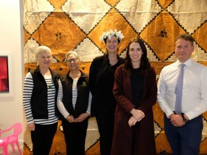 Alison Bourn and Hana Costigan from Te Puawaitanga ki Ōtautahi Trust, Carmen Collie from Tangata Atumotu Trust, prime minister Jacinda Ardern and Ceri Benger from Life Pharmacy Hornby 