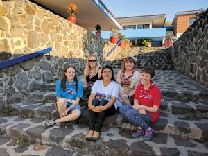 Marie Tsai with English Girl Guide leaders at Our Cabaña in Mexico. Marie is pictured front, centre