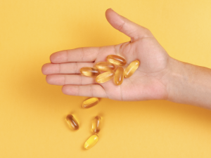 Hand with Omega capsules 