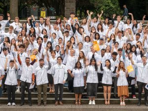 Otago students don white coats