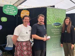 MPA members Loren Vincent Brendon McIntosh and Dr. Leanne Te Karu stall at Kāi Tahu Hui ā-iwi