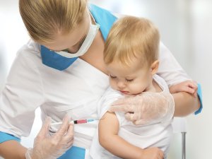 Baby getting vaccination [Image: CDC]