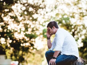 Depressed man CR Ben White on Unsplash