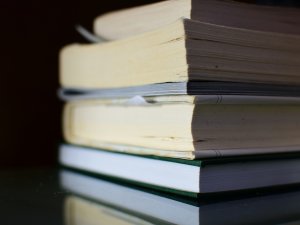 Stack of books, black background